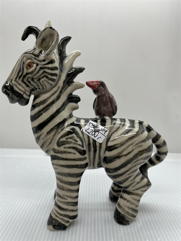 Zebra med fugl